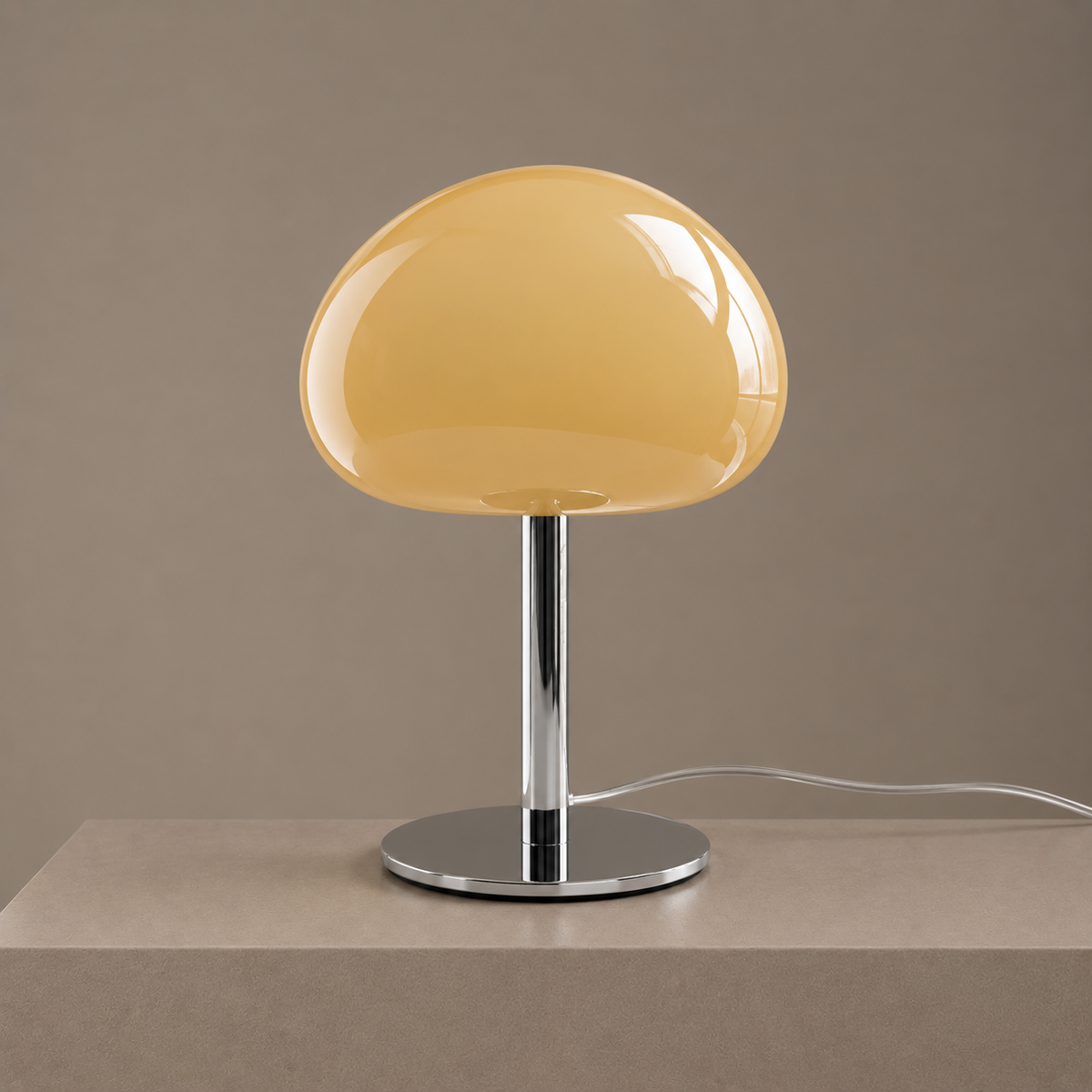 Cream glass mushroom table lamp with a polished chrome stem and round base on a neutral studio backdrop.